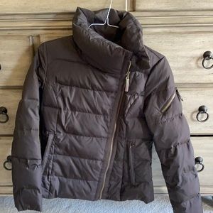 Andrew Marc puffer jacket in a deep brown.